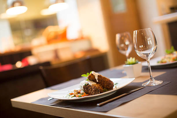 istock Grilled meat with sauce and herbs served at restaurant 504824402