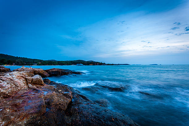 istock sea with rocks and sunset glow 504824752
