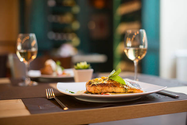 istock Grilled salmon with sauce and herbs 504825744