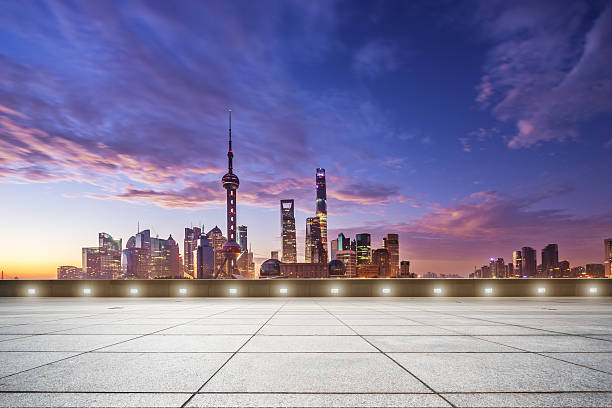 istock empty floor and cityscape in colorful sky at dawn 504826480
