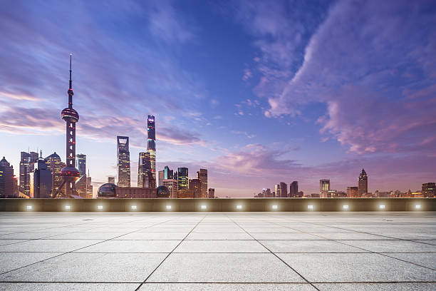 istock empty floor and cityscape in colorful sky at dawn 504827086
