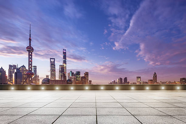 istock empty floor and cityscape in colorful sky at dawn 504827384