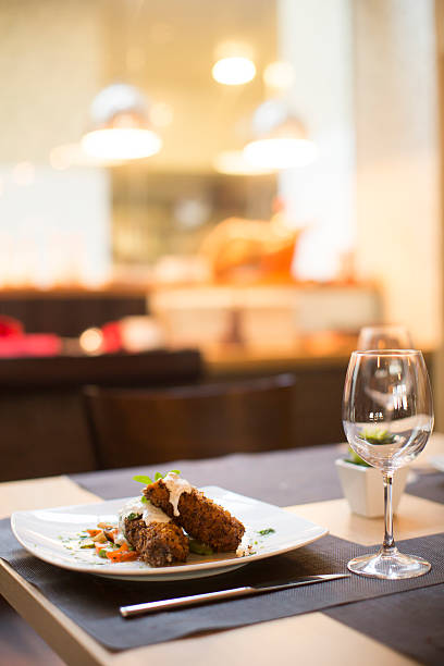 istock Grilled meat with sauce and herbs served at restaurant 504827392