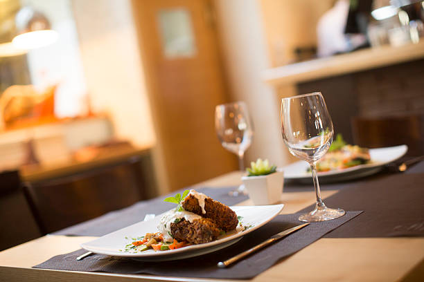 istock Grilled meat with sauce and herbs served at restaurant 504827626