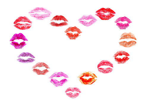 Heart shape made of different lipstick kisses isolated on white. Space for copy inside.