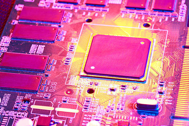 istock Gold yellow with red light of circuit board with processor close-up 504830138