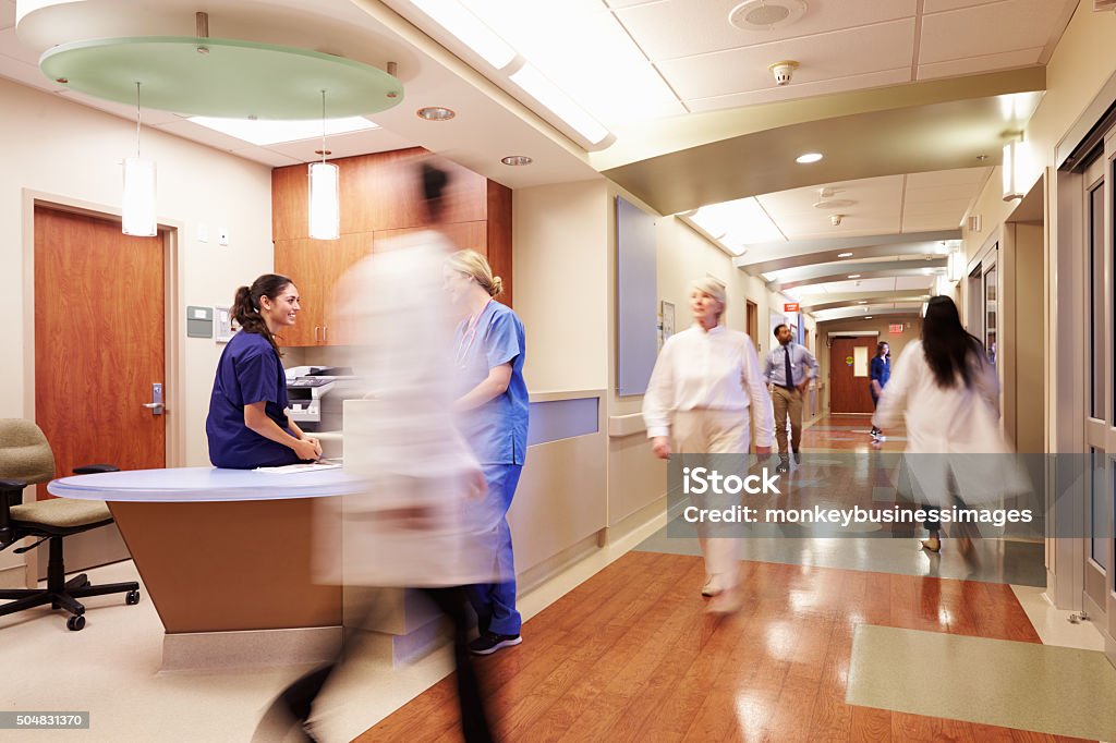 Busy Nurse's Station In Modern Hospital Hospital Stock Photo
