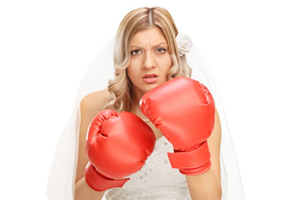istock Angry bride with red boxing gloves 504832424