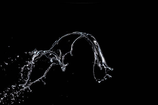 água splash isolada em fundo preto - wave effect imagens e fotografias de stock