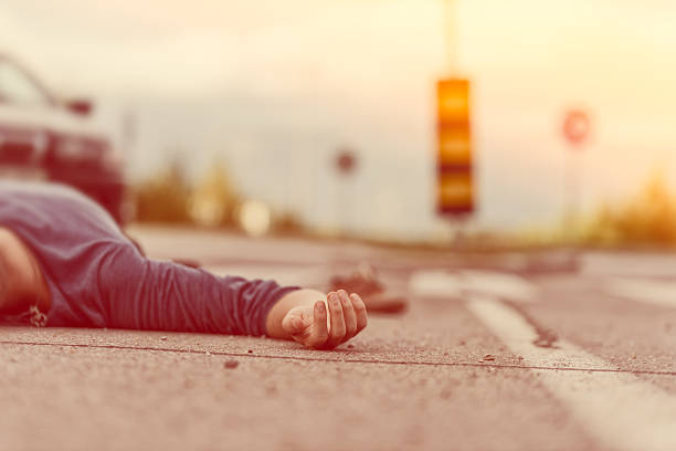 istock Traffic accident.Young man hit by a car 504852484