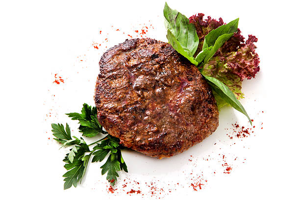 istock Veal steak with greens and herbs 504852676