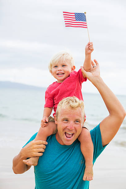 istock Father and son playing on the beach 504854111