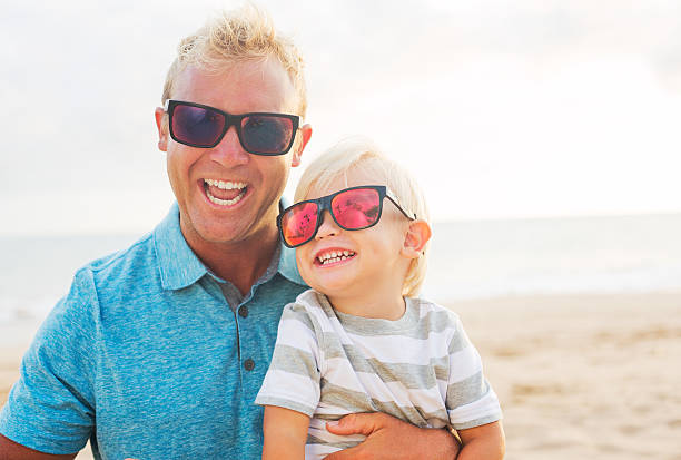istock Father and son at the beach 504854119