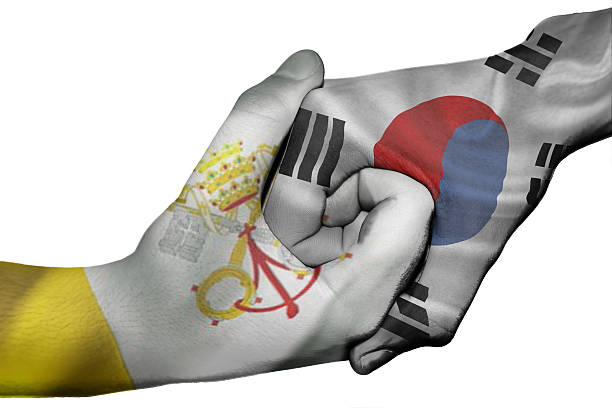 istock Handshake between Vatican City and South Korea 504854813