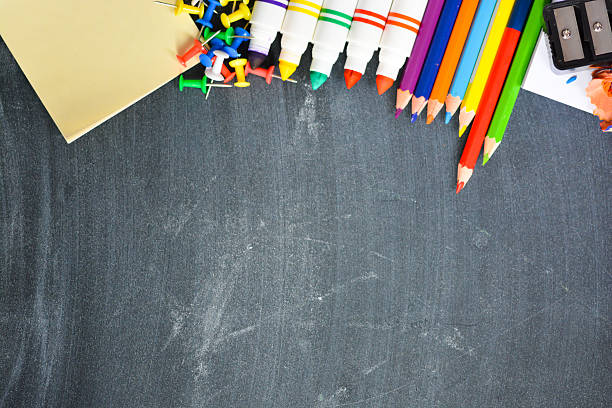 istock Blackboard background with school supplies suggesting back to school season 504855352