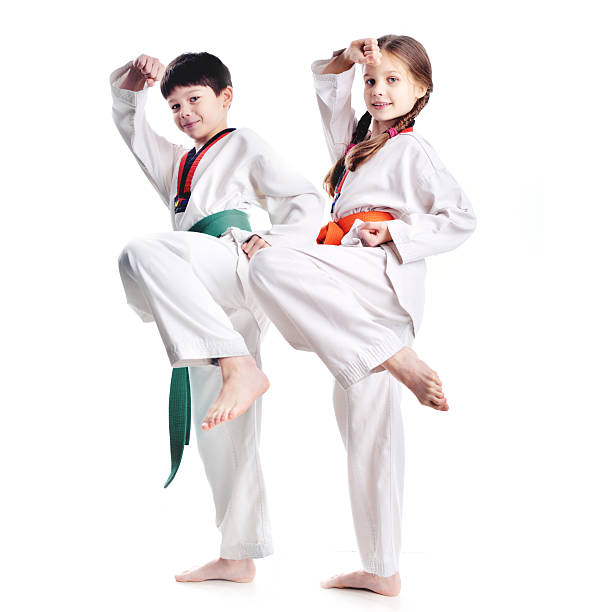 Two children athletes martial art taekwondo trainingTwo children athletes martial art taekwondo training