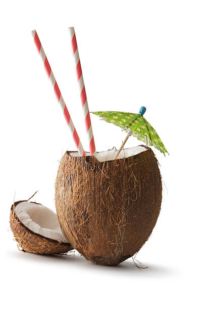 nüsse: kokosnuss, regenschirm und stroh - drink umbrella stock-fotos und bilder