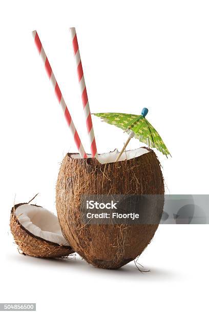 Nuts Coconut Umbrella And Straw Stock Photo - Download Image Now - Coconut, Drink, Drinking