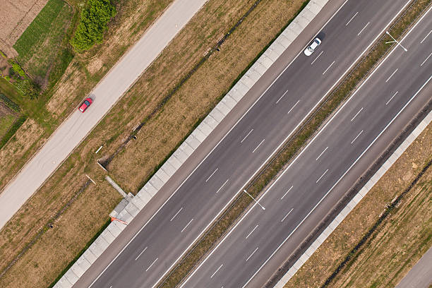 istock aerial view of highway and railway 504857928