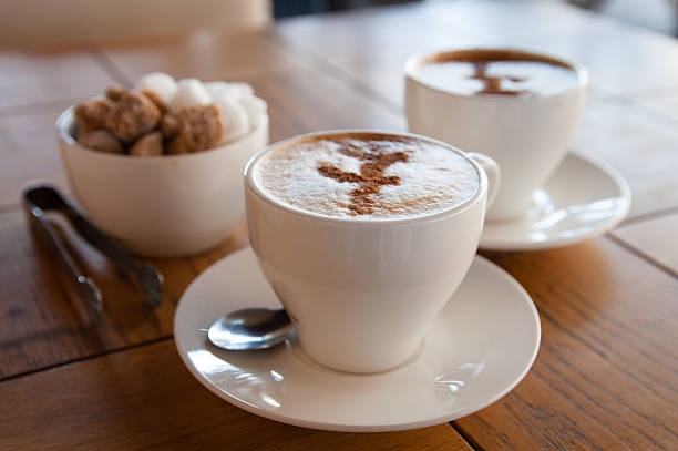 istock cups of coffee and sugar 504859883