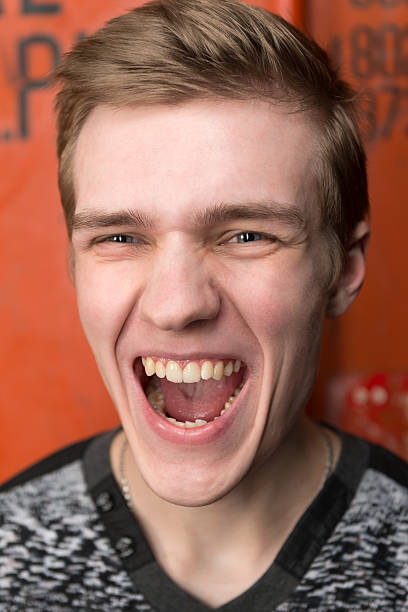 istock Portrait of screaming young man 504861644