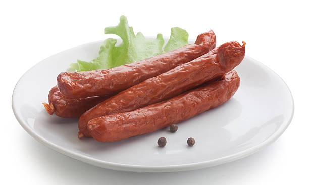 istock Smoked sausages with lettuce (Jagdwurst) 504861764