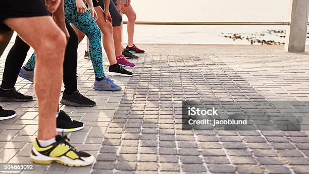 Athletes At Start Position Stock Photo - Download Image Now - In A Row, Running, Starting Line
