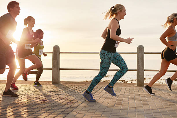 istock Young people running marathon race 504863152