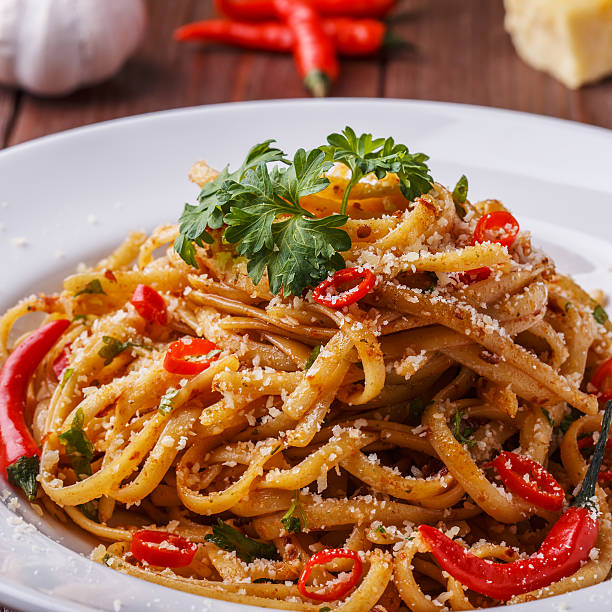 istock Homemade linguine pasta in arrabbiata sauce. 504863404