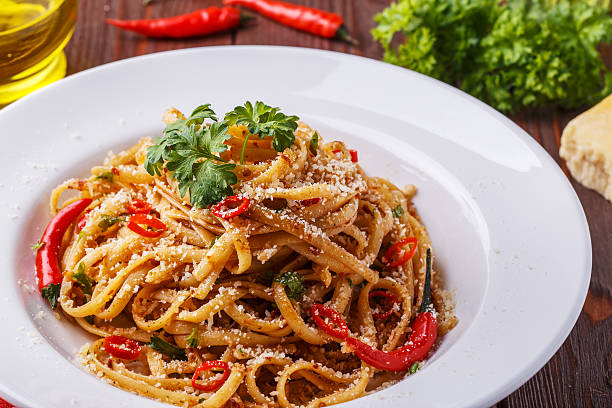 istock Homemade linguine pasta in arrabbiata sauce. 504863458
