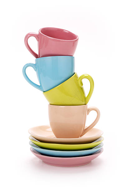 istock Stack of colorful coffee cups isolated on white 504864106