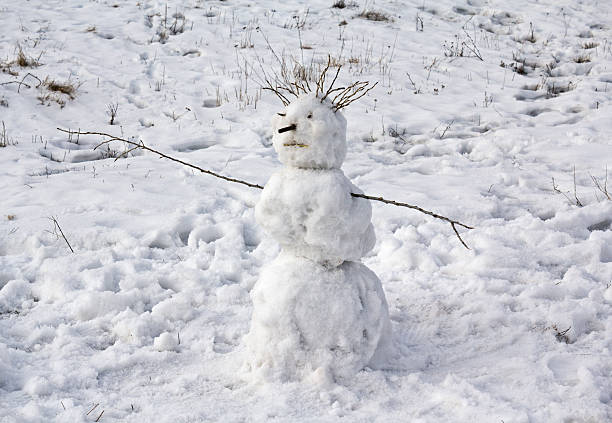 istock Lone snowman left on the playground. Winter 504865156