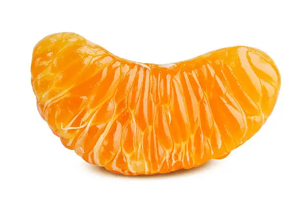 Delicious slice of ripe tangerine on a white background