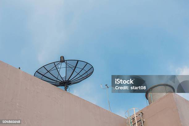 Satellite On The Building Stock Photo - Download Image Now - Backgrounds, Blue, Broadcasting