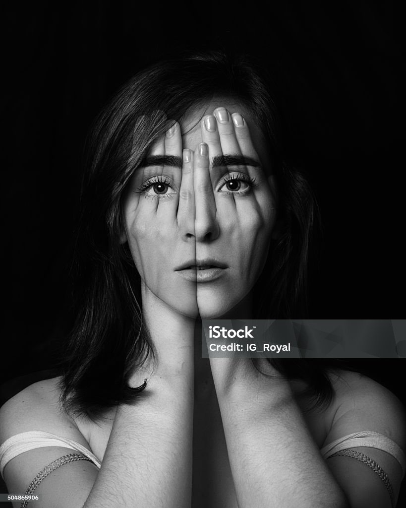 Young girl covering  face and eyes with her hands.Double exposure Surreal portrait of a young girl covering  her face and eyes with  her hands.Double exposure. Black and White. Human Face Stock Photo