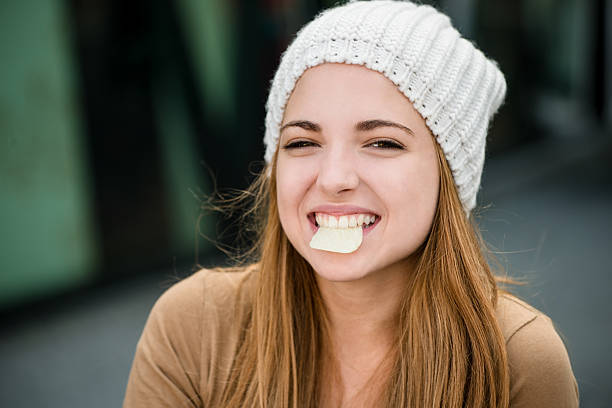 istock Teenager eating  chips 504868022