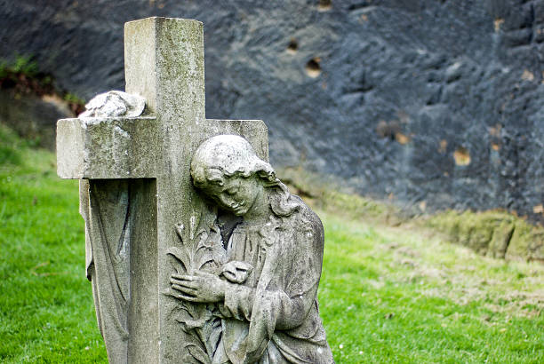 Shot of a gravestone in a cemetery