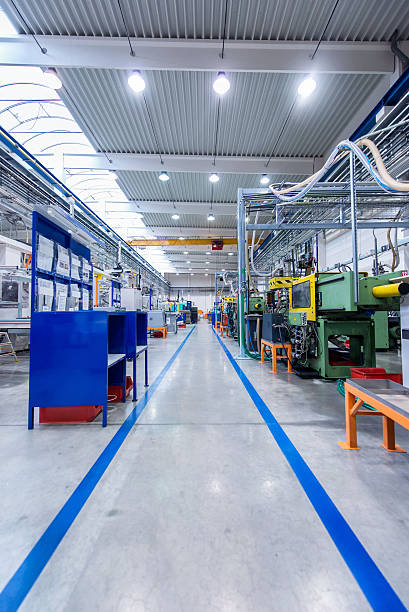 istock Aisle in large factory 504874934