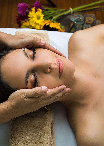 istock Hispanic brunette model getting massage spa treatment, hands working on 504882046
