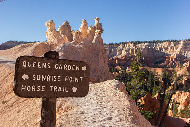 Wooden sign on Queens Garden trail in Bryce Canyon Wooden sign on Queens Garden trail in Bryce Canyon National Park, Utah, USA sunrise point stock pictures, royalty-free photos & images