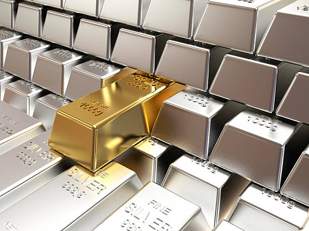 istock Stacks of silver bars with one of gold. 504885516