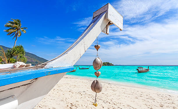 istock Boat on a tropical island, summer holidays concept. 504885874