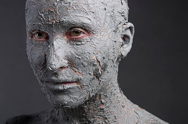 istock Statuesque woman in clay. Spa treatment 504886894