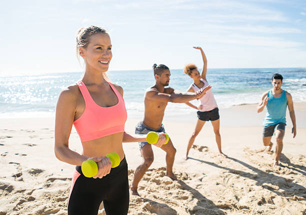 istock Young people exercising outdoors 504887386