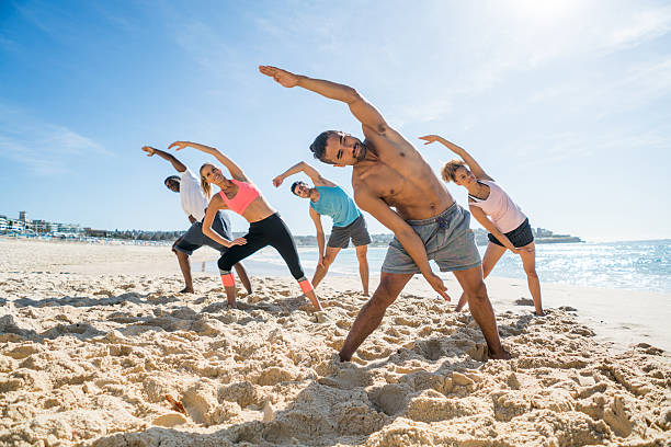 istock People in an aerobics class at the beach 504887600
