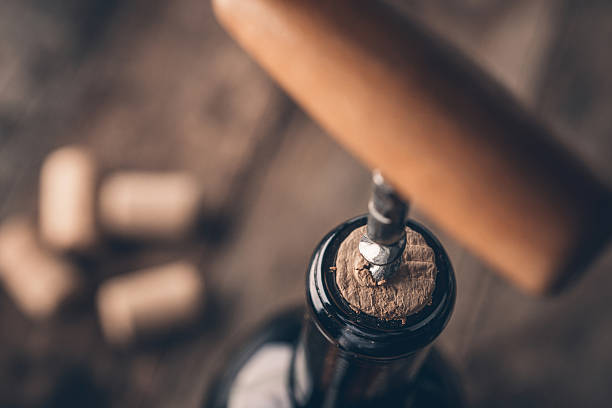istock Corkscrew and bottle of wine on the board 504888858