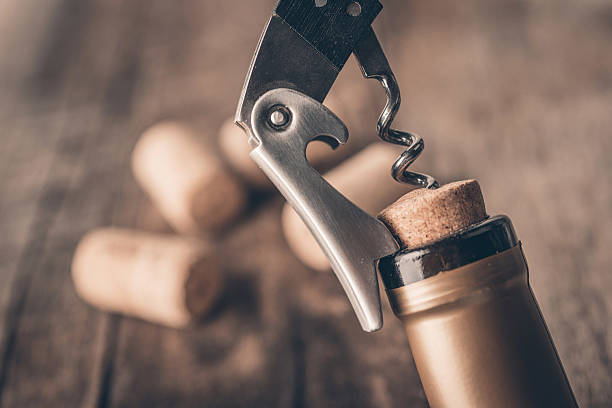 istock Corkscrew and bottle of wine on the board 504889268
