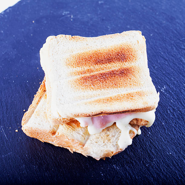 istock Toast over black stone plate 504889380
