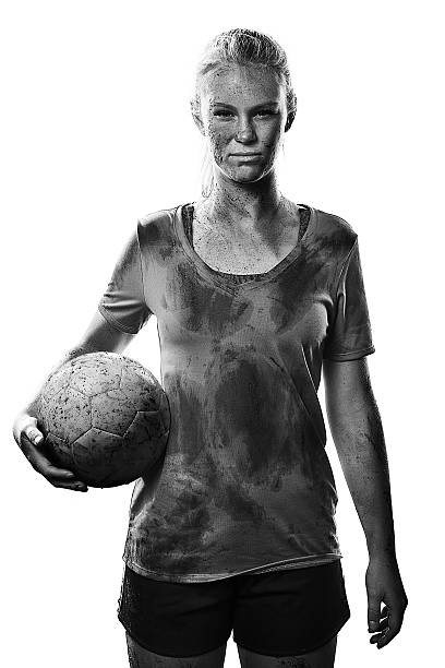 muddy adolescente menina com bola de futebol no branco - soccer teenager sport adolescence - fotografias e filmes do acervo