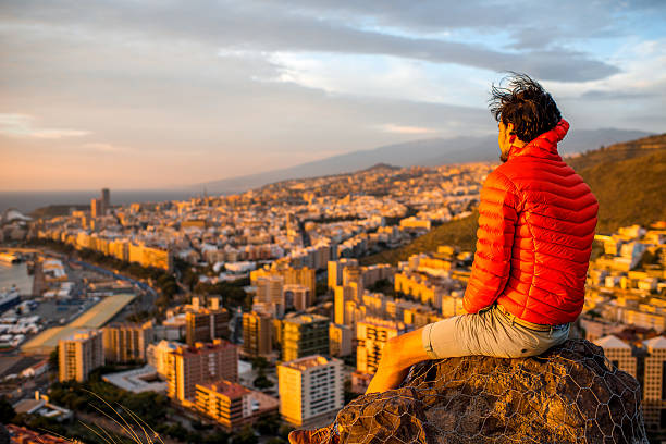 Man enjoying beautiful cityscape view on Santa Cruz city on Canary islands